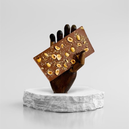 Milk Chocolate topped with Roasted Hazelnuts