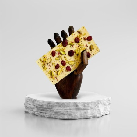 White Chocolate topped with Cranberries, Pistachios & Edible Rose Petals